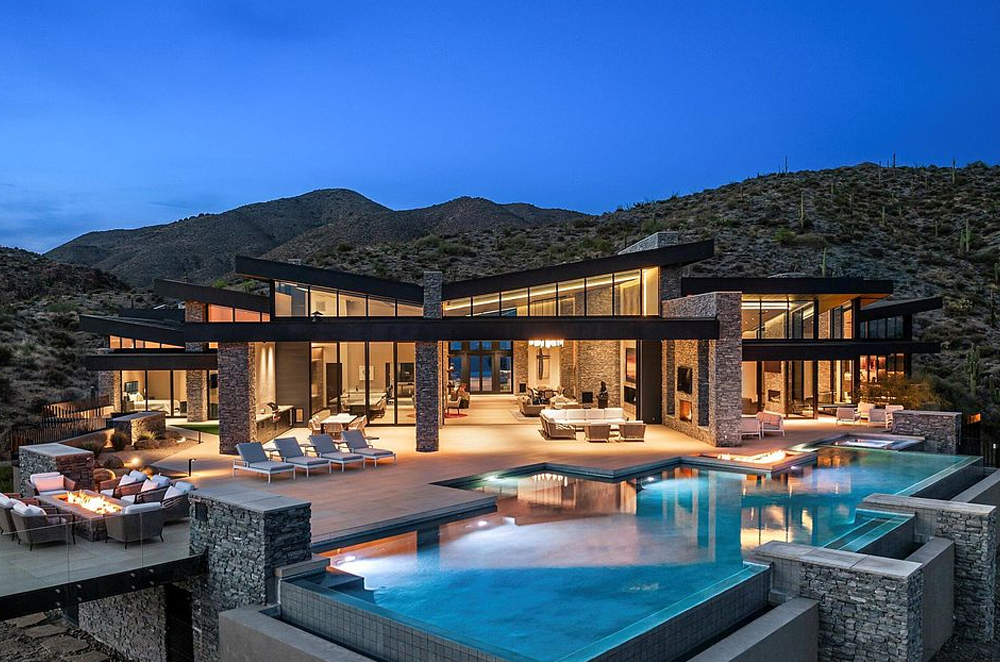 A sprawling modern luxury estate in Scottsdale featuring contemporary desert architecture and a premium pool deck