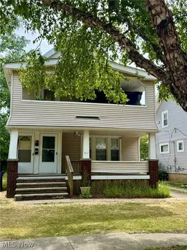 Cleveland single-family home with well-maintained lawn