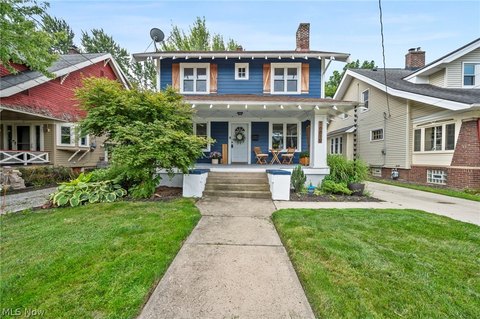 Cleveland home with for sale sign in front yard