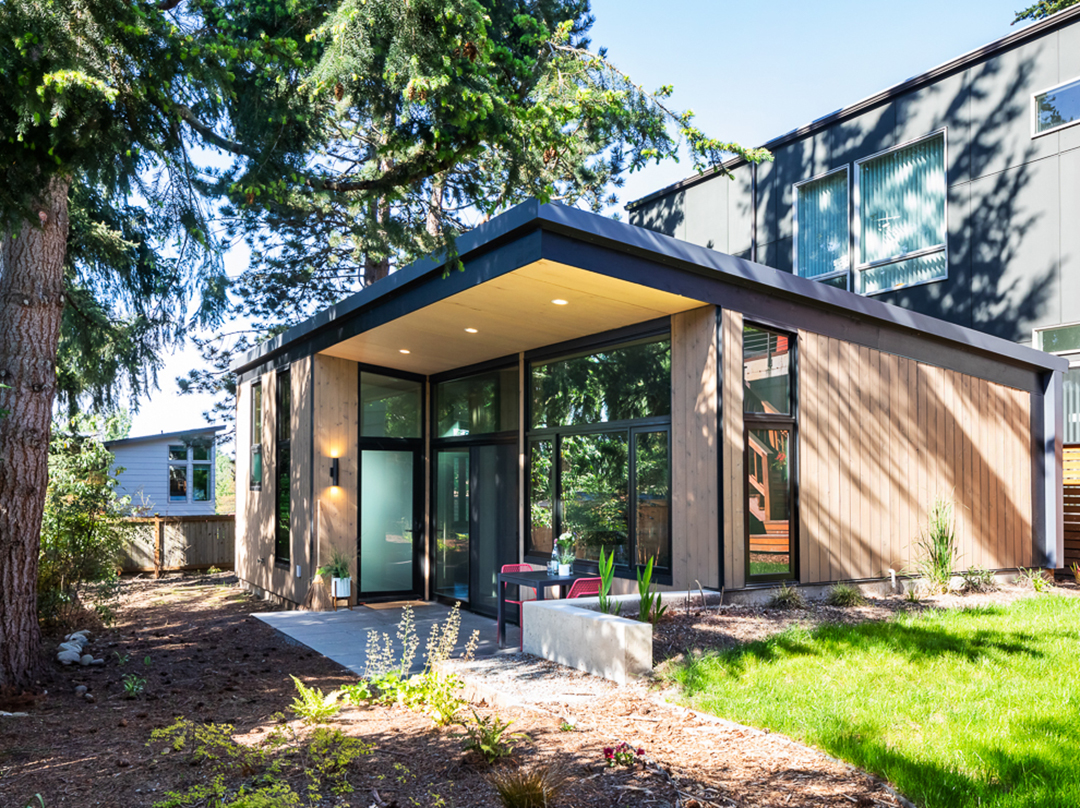 A modern detached ADU, or backyard cottage, in a Seattle yard