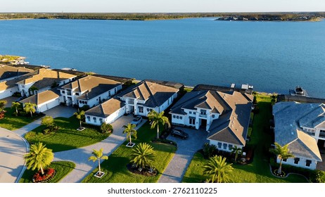 Aerial view of a Fort Myers waterfront community with homes and canals