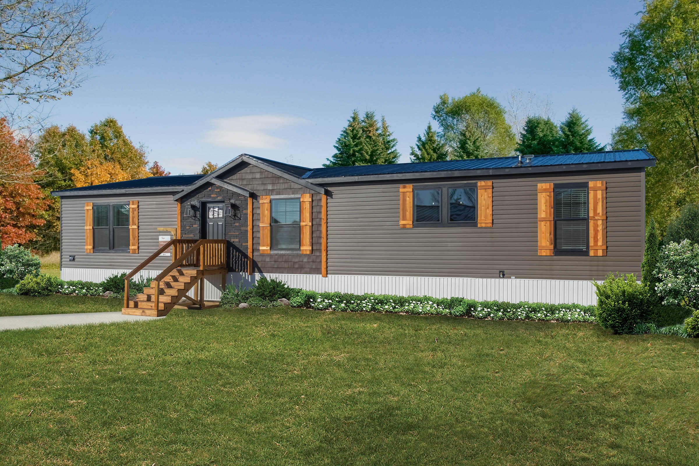 A modern manufactured home in a rural Idaho setting