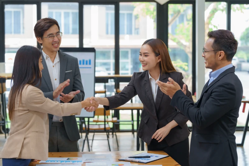 Professional handshake at a home closing