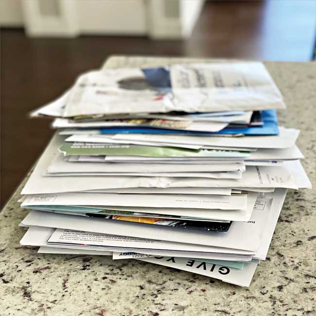 Stack of Medicare junk mail envelopes