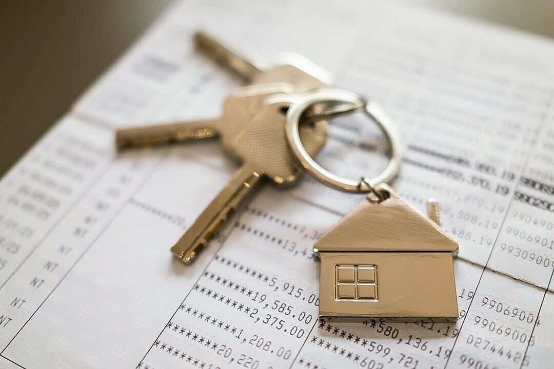 Rental property with house keys in foreground