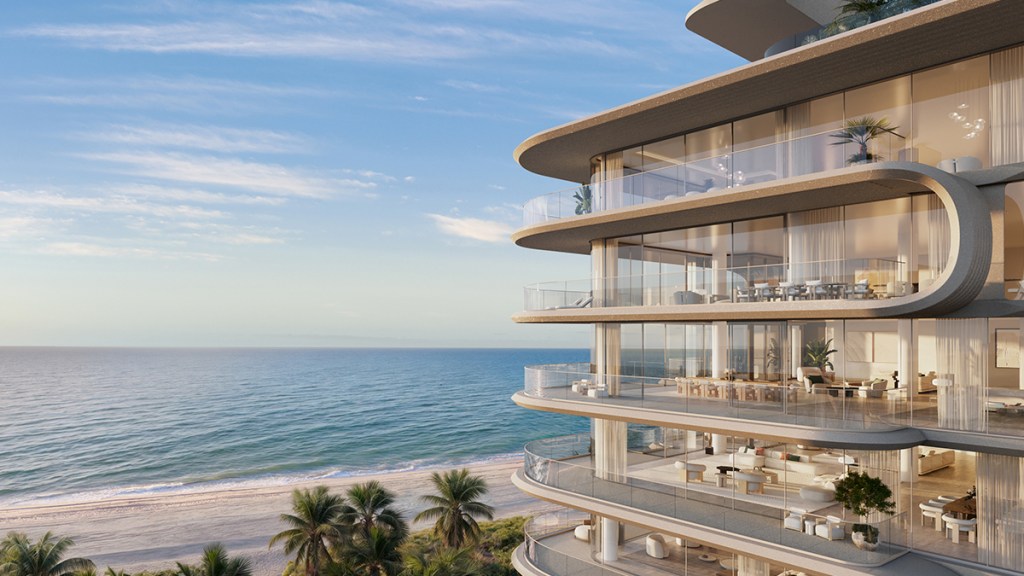 Florida coastal condo building with concrete balconies and ocean views
