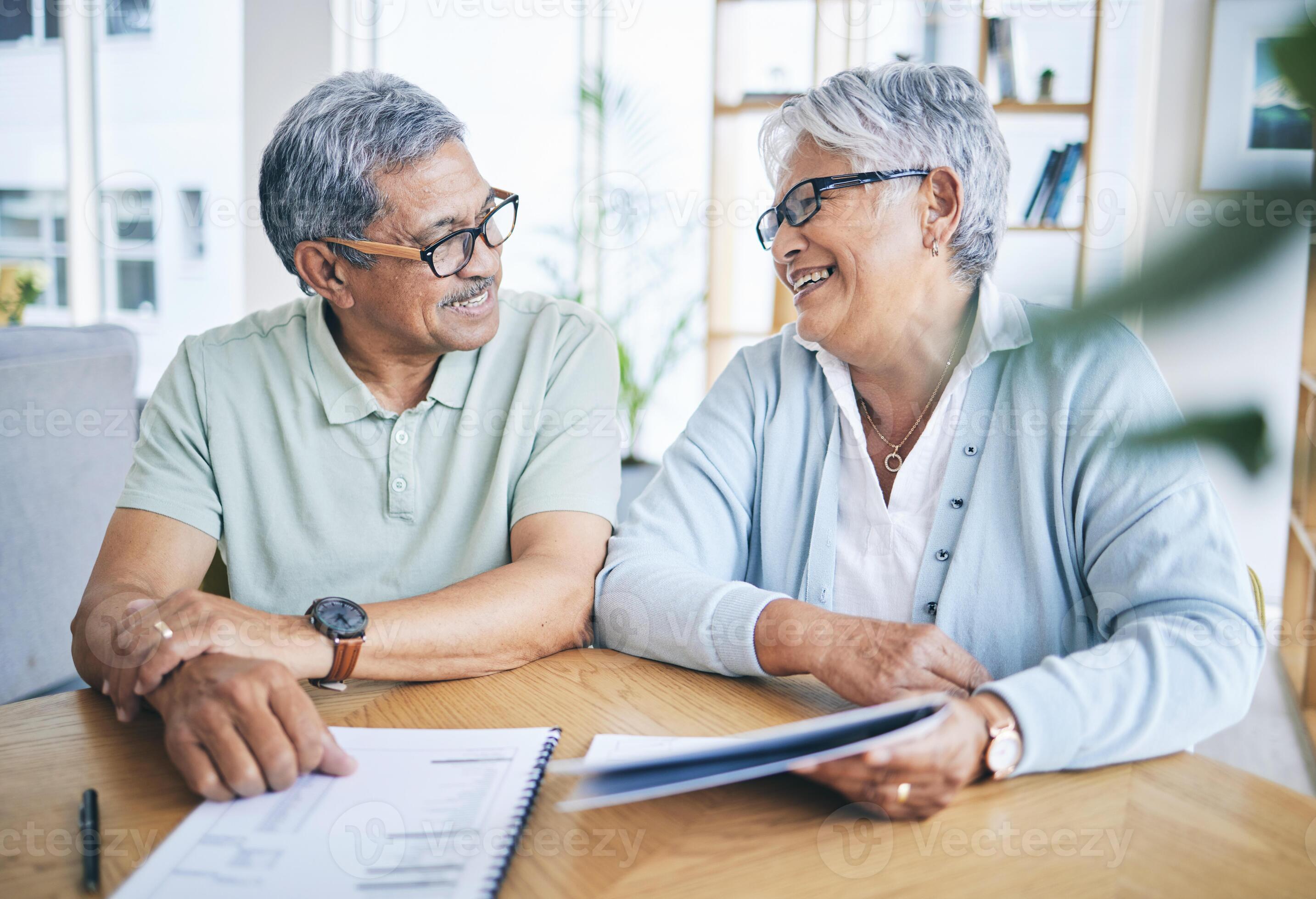 retirement couple financial planning paperwork mortgage