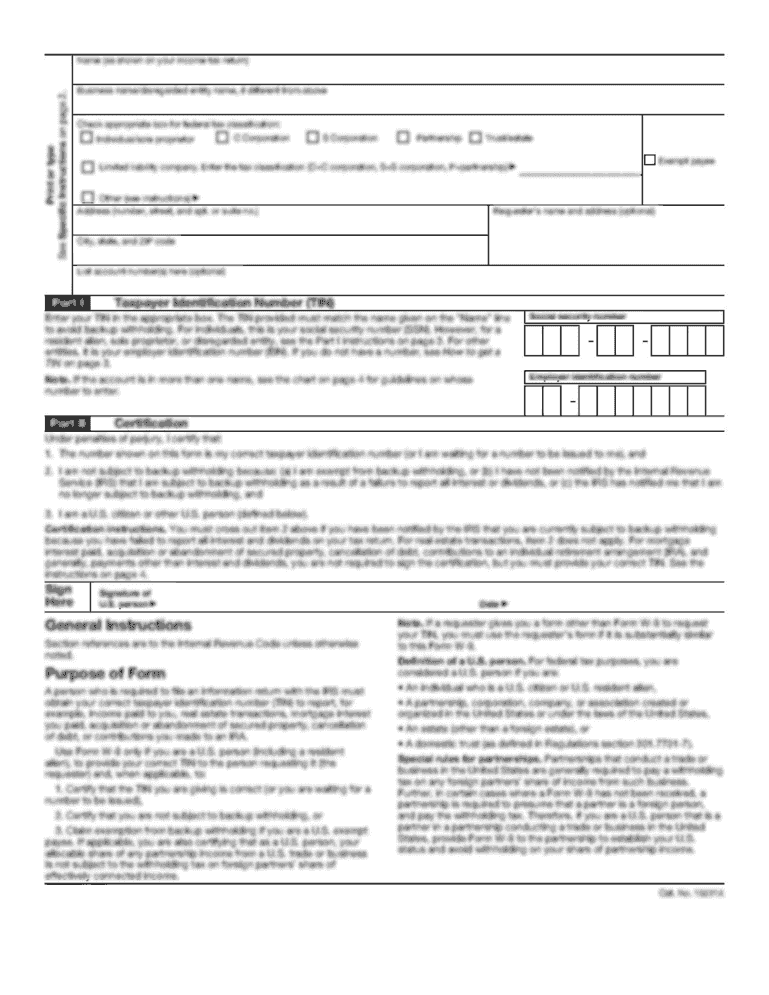 A buyer and agent reviewing a real estate contract and closing checklist at a desk