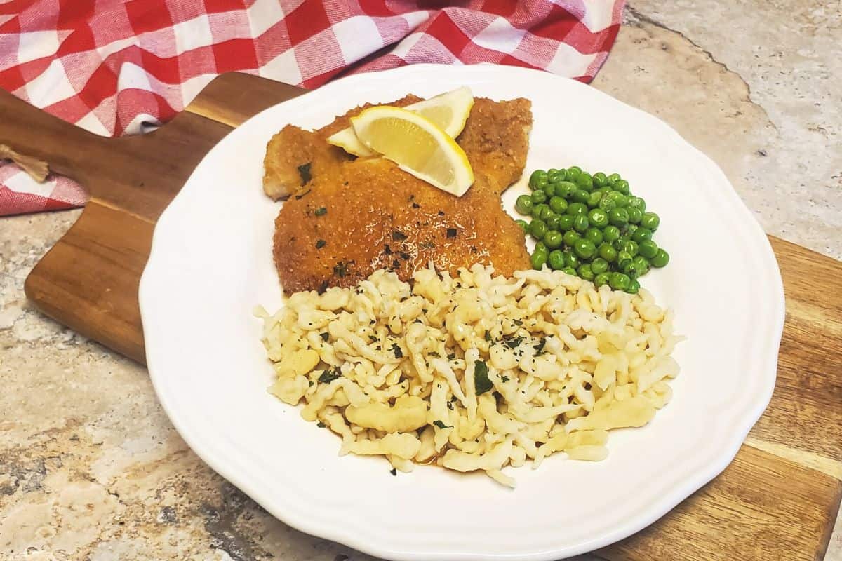 Plated German schnitzel with spätzle