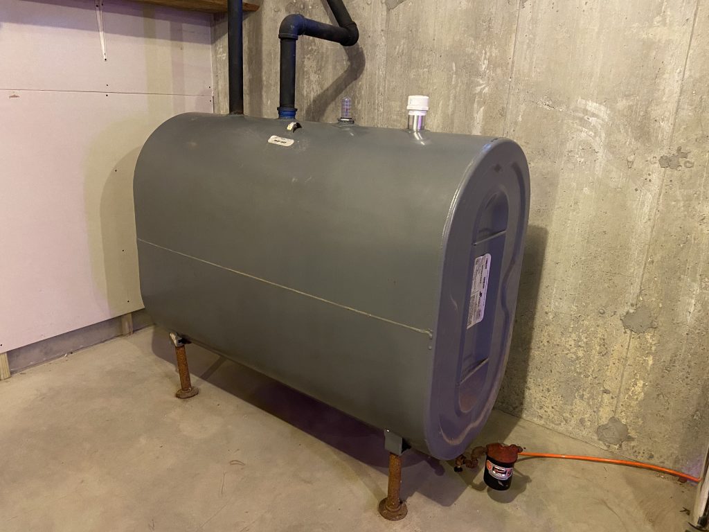 A heating oil tank and propane furnace serving a mountain home