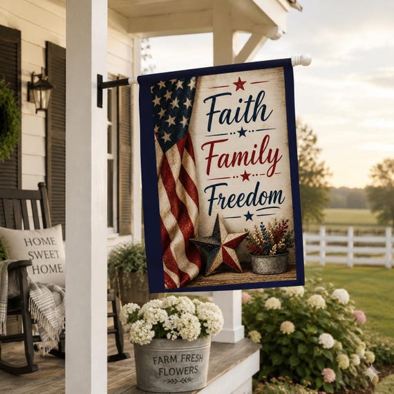 A family standing in front of their new house with a U.S. flag