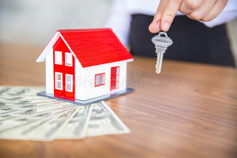 Home keys held in hand, symbolizing first-time homeownership