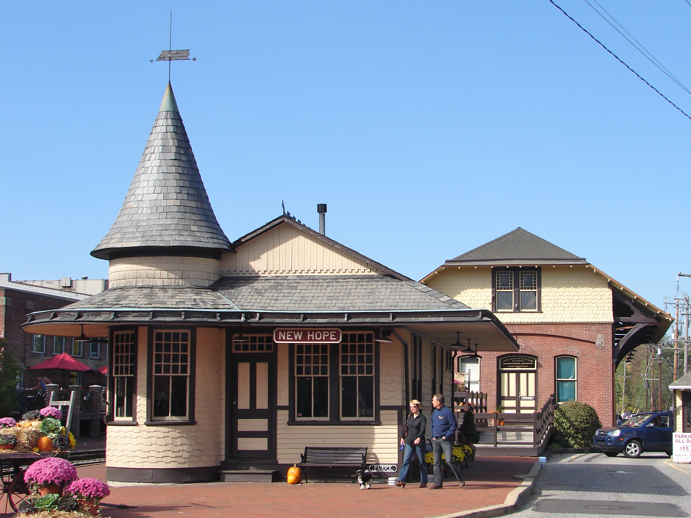 A Main Street in New Hope, Pennsylvania, lined with historic buildings near the Delaware River