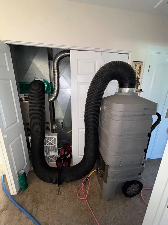 Our Hypervac Revolution Hybrid system connected to a residential furnace for source removal