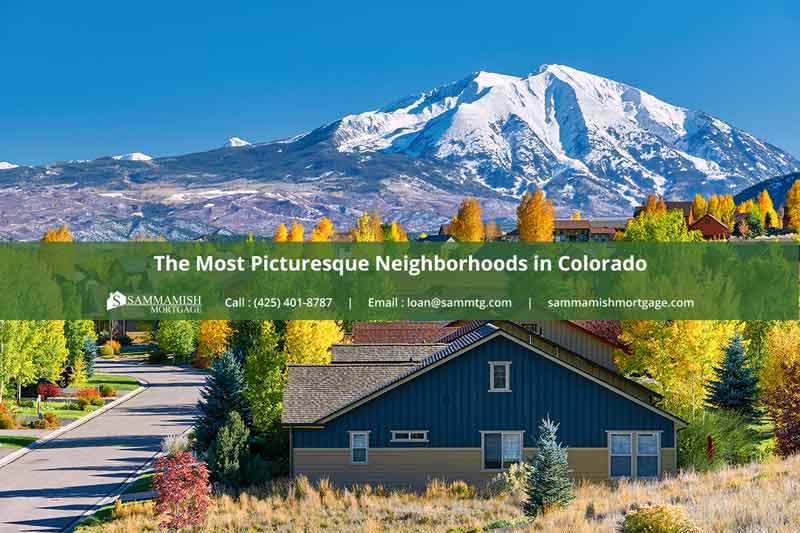 A suburban Colorado home with the Front Range mountains behind it