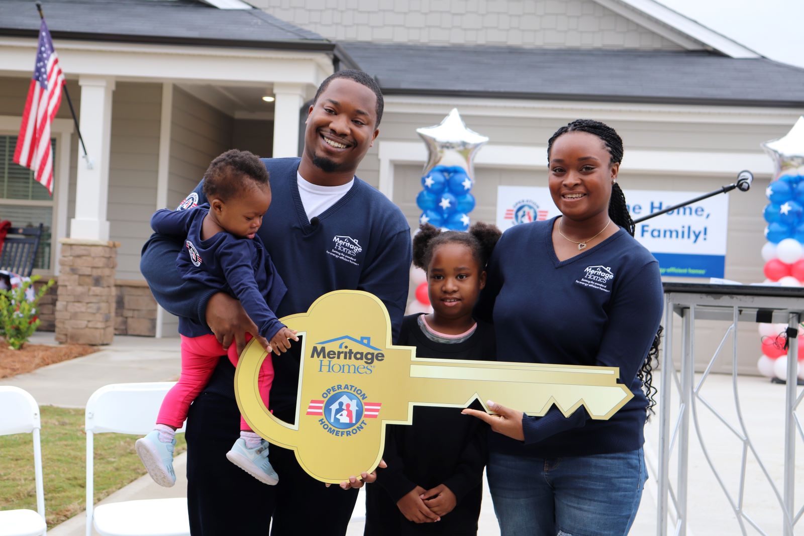 A veteran family celebrating their new home purchase