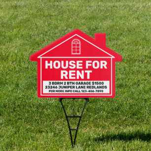 House with a for-lease sign in front