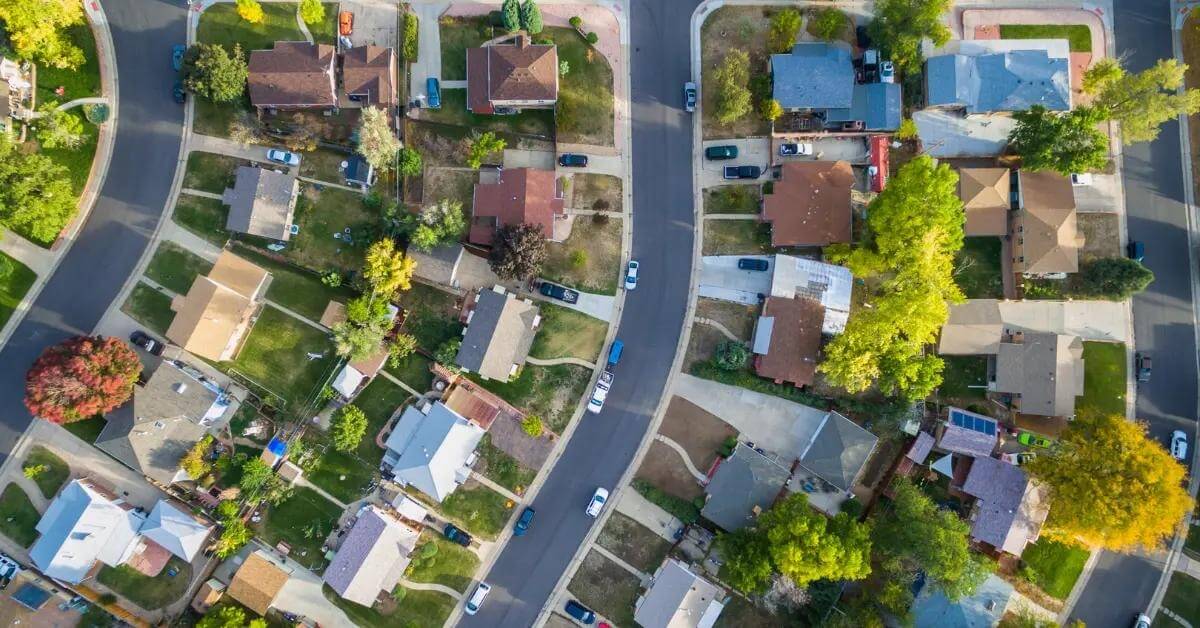 A residential street and family homes in a community near Fort Meade.